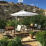 Отель The Village Cave 4*
